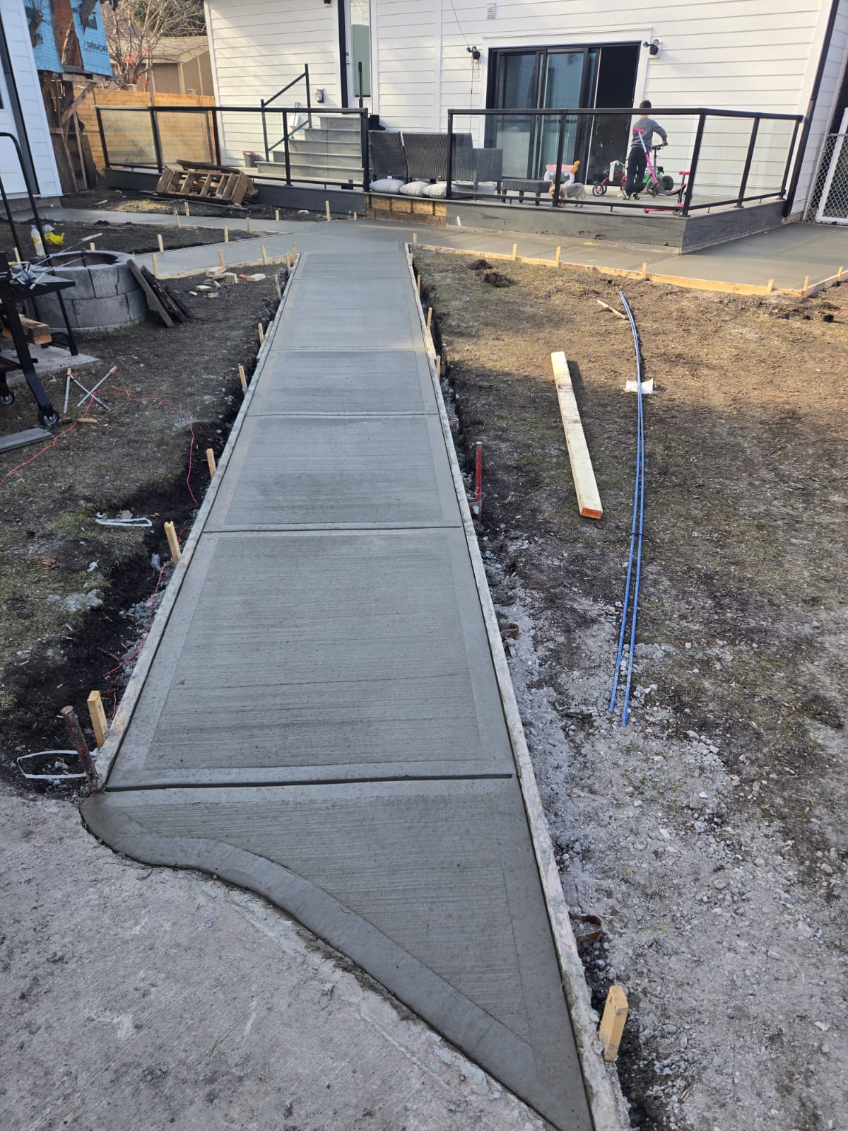Side yard walkway freshly poured