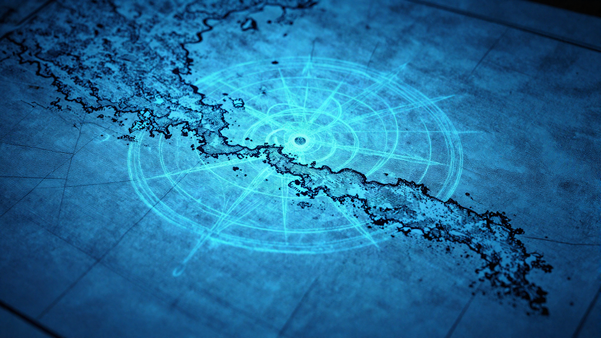 Aged nautical chart with engraved coastline and rhumb lines in blue