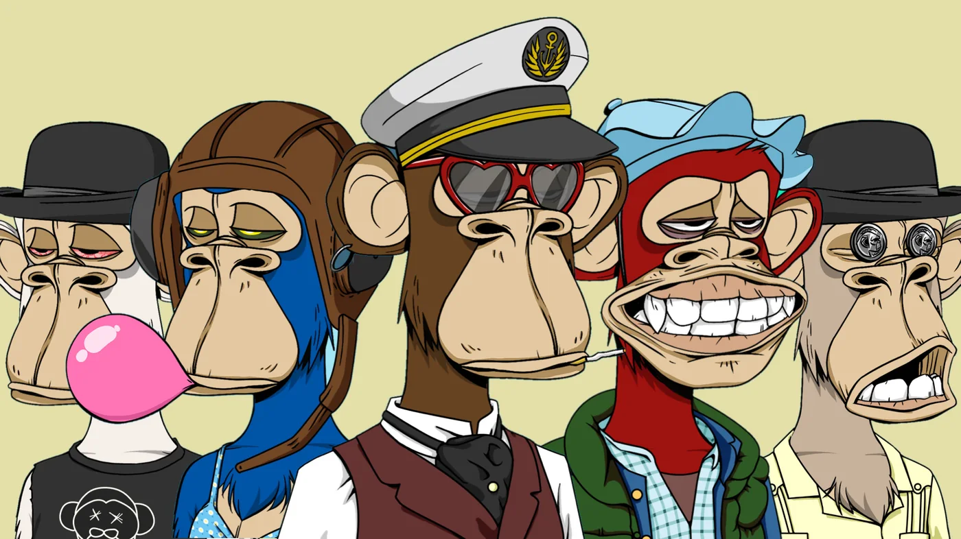 Five Bored Ape Yacht Club apes side by side in close up, one blowing a bubblegum bubble and one in a captain hat and heart shaped sunglasses