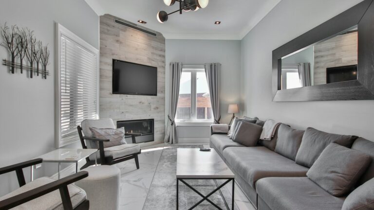 Open plan living room of a short term rental ready for guests